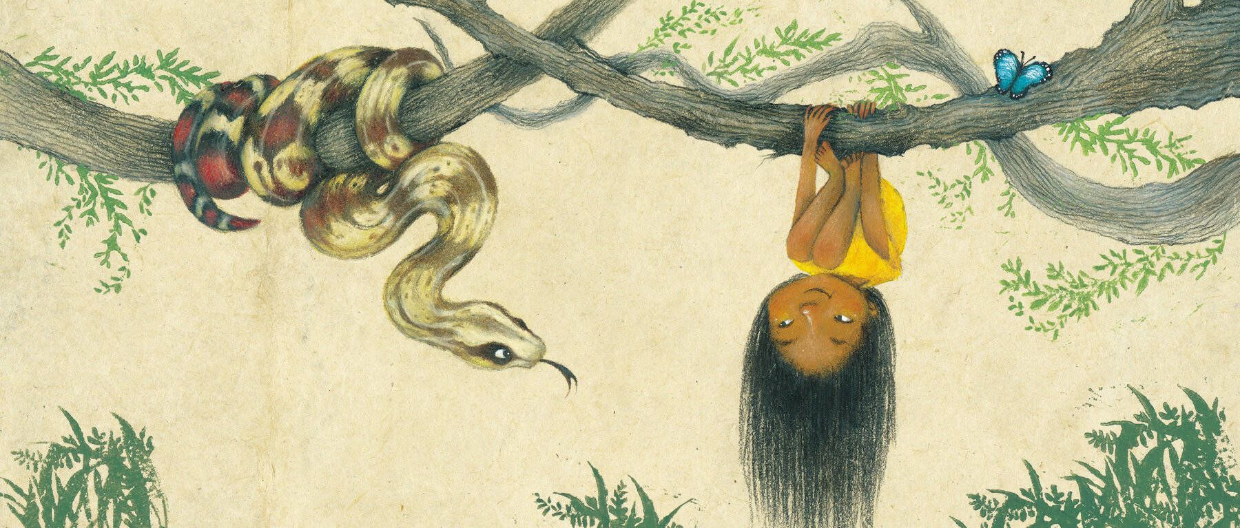 Little girl hangs upside own from a tree next to a boa constrictor