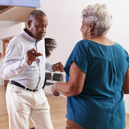 People attending dance class in community center