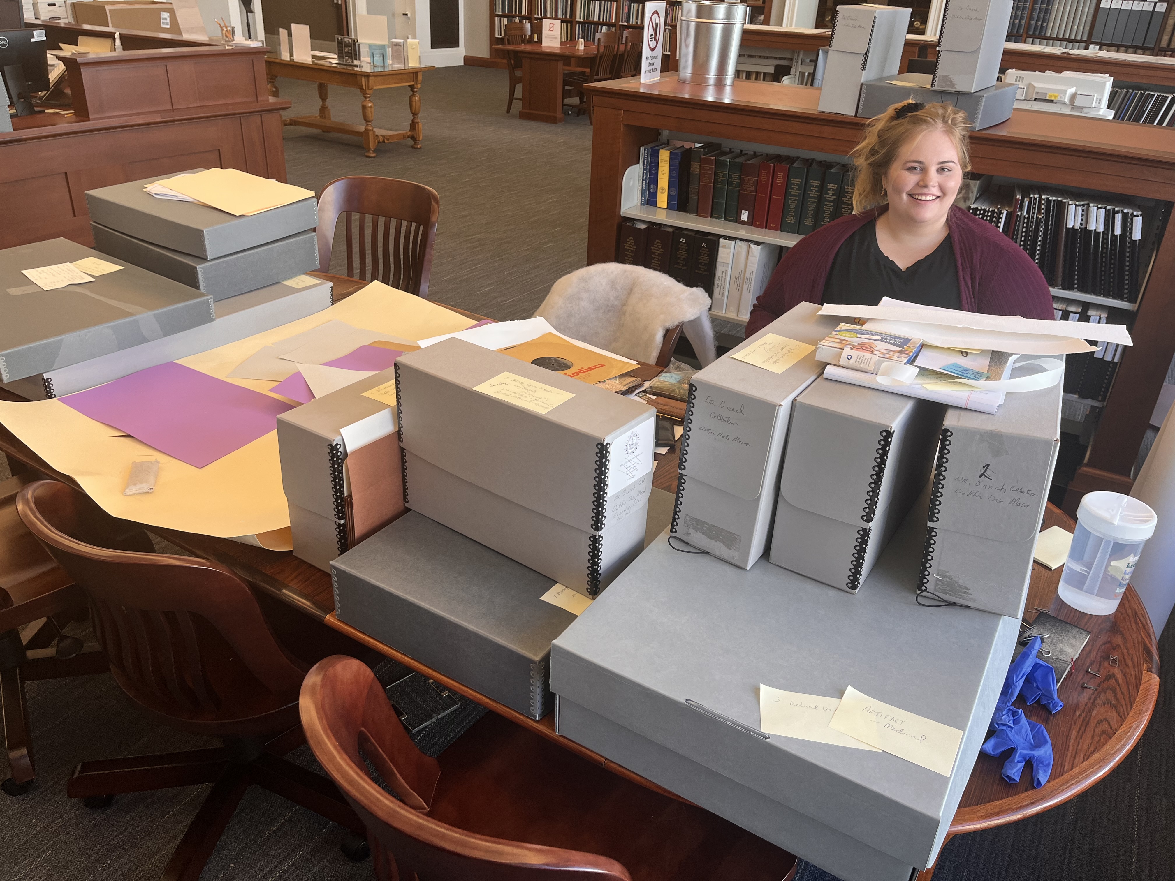 Jamie working diligently on the Dr. Ray C. Bunch Collection. 