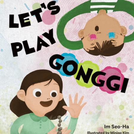 Book Cover of "Let's Play Gonggi." Image contains two children, a boy and a girl,  playing with plastic game pieces; boy uses game pieces to simulate goggles. 