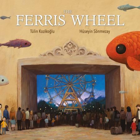 Cover of picture book "The Ferris Wheel." Image has large goldfish floating in foreground above a ferris wheel set off in a rectangular stone arch. There are queues of people flanking each side of stone arch framing the ferris wheel. On the left hand side, there is boy with his mother. He is wearing a yellow raincoat. On the right hand side a girl is accompanied by her father. She wears red, and he carries a blue suitcase. 